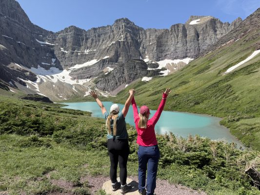 Hikers celebrate reaching Cracker Lake.